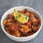 Meat With Onion And Tomatoes